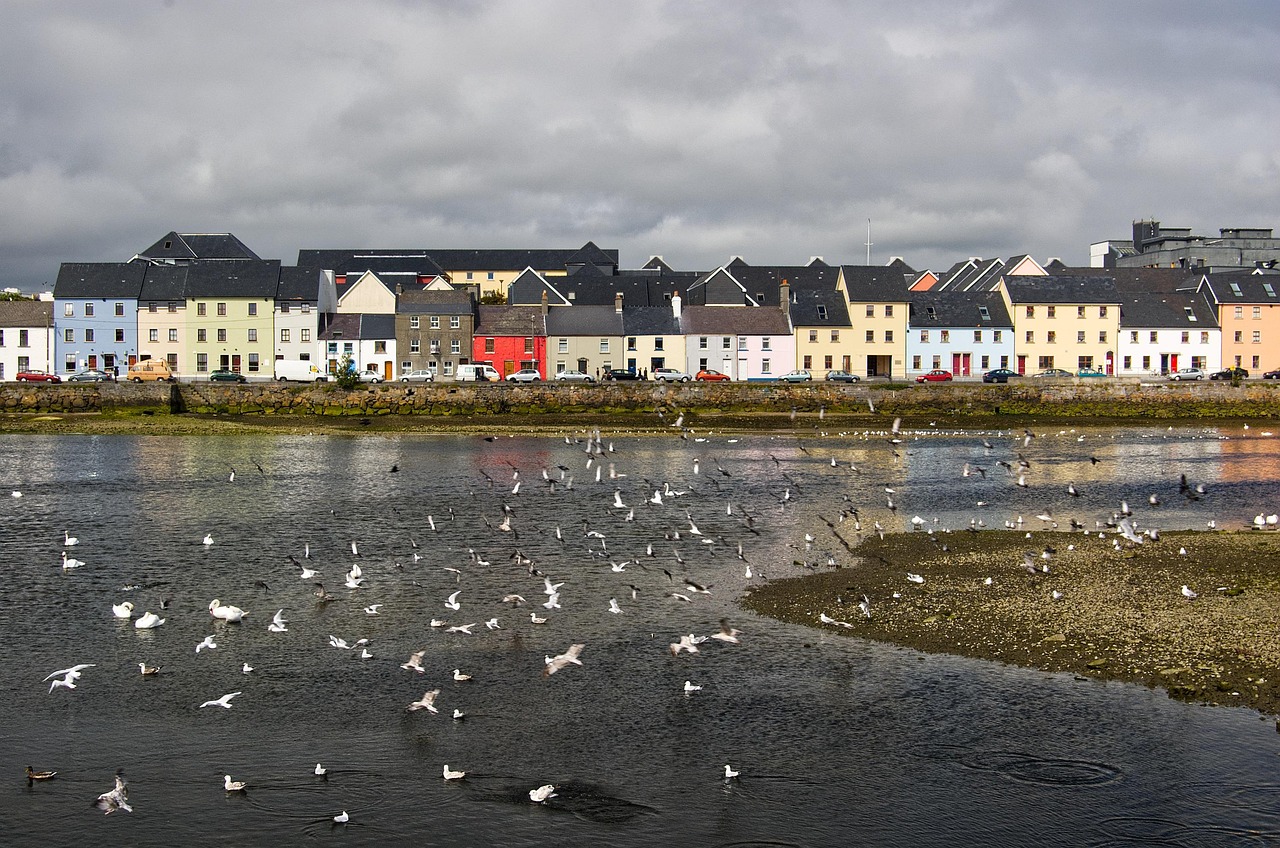 Galway city waterfront with colourful houses — a classic free walk photo spot near the bay